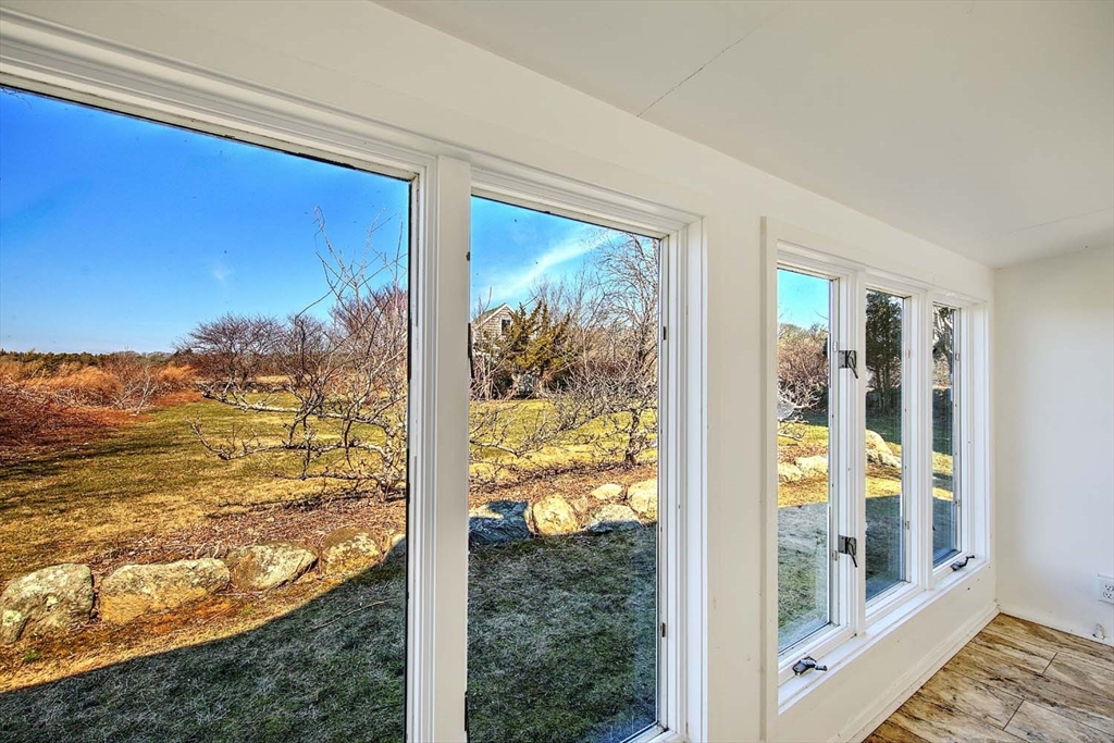 408 Hixbridge Road Westport, MA 02790 - Photo 27 of 35 a view of a floor to ceiling window and front door