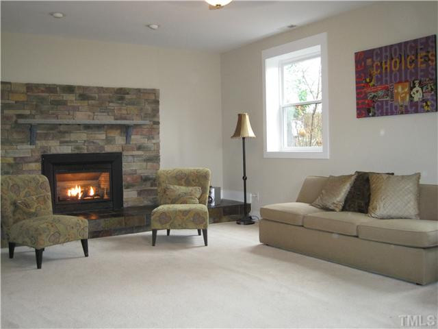 407 Glascock Street Raleigh, NC 27604 - Photo 3 of 25 Lots of natural light in this large living room. Living Room