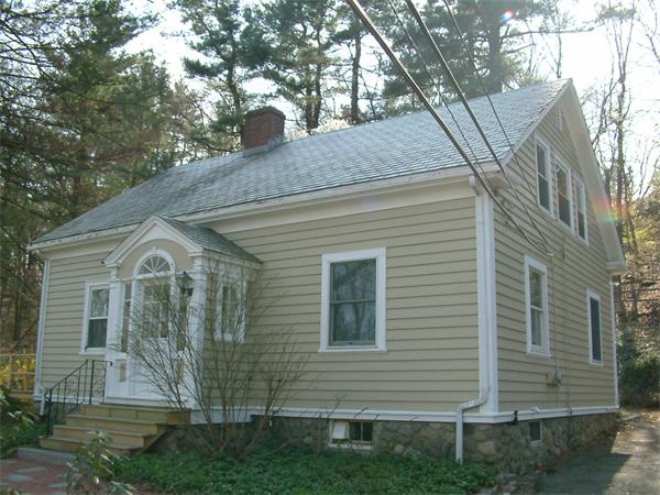 20 York Street Lexington, MA 02420 - Photo 1 of 7 a front view of a house with a yard
