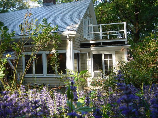 20 York Street Lexington, MA 02420 - Photo 2 of 7 front view of house with a potted plant