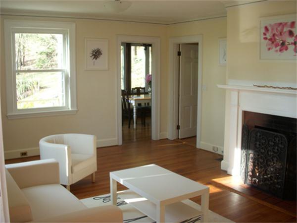 20 York Street Lexington, MA 02420 - Photo 6 of 7 a living room with furniture and a fireplace