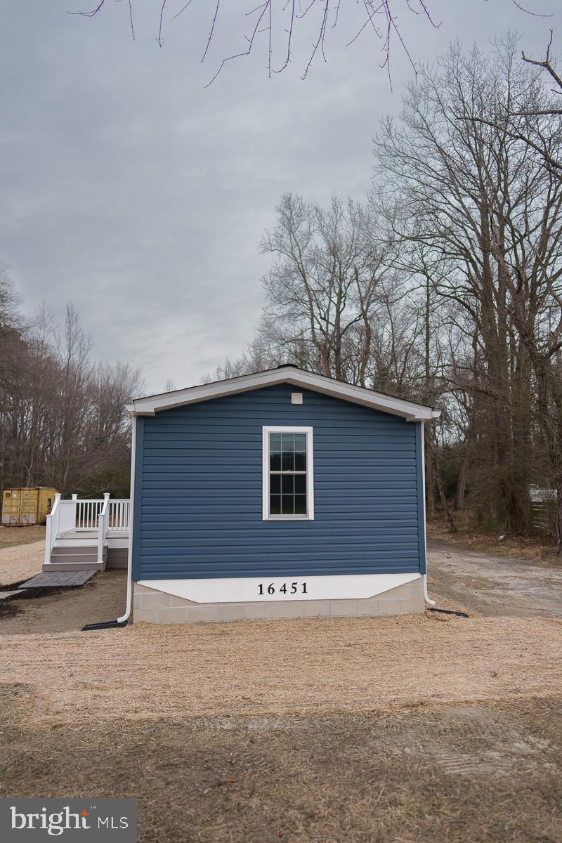16449 Polk Road Bridgeville, DE 19933 - Photo 22 of 22 a house with a outdoor space