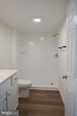 a bathroom with a toilet and a sink