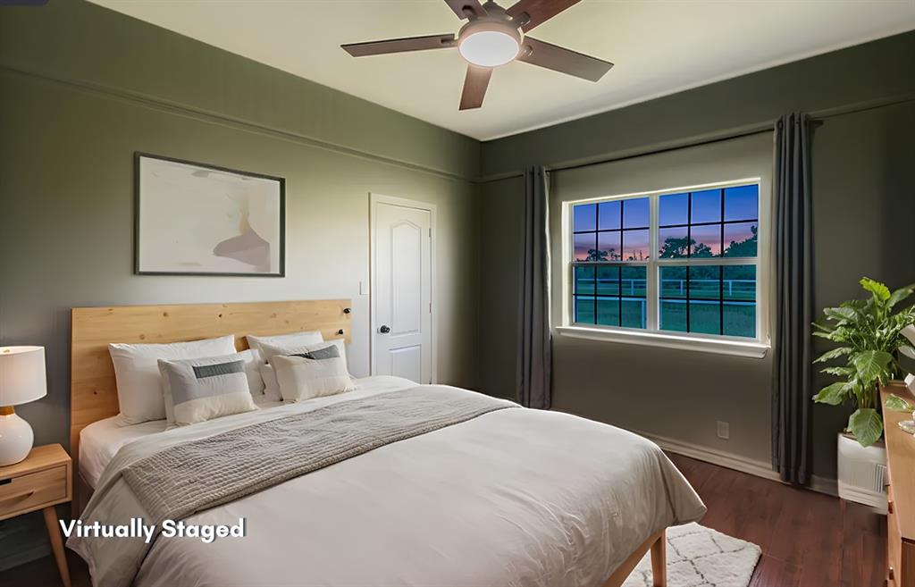 13507 Friendship Road Pilot Point, TX 76258 - Photo 24 of 39 a bedroom with a large bed and a window