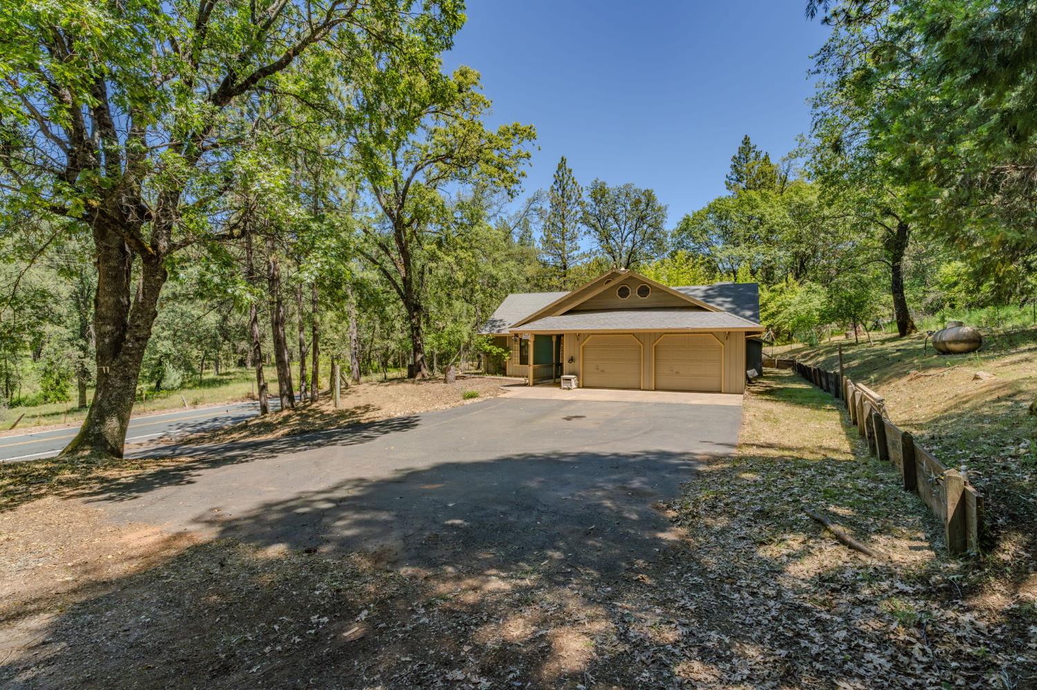 20310 State Rte 26 West Point, CA 95255 - Photo 54 of 57 a front view of a house with a yard and trees