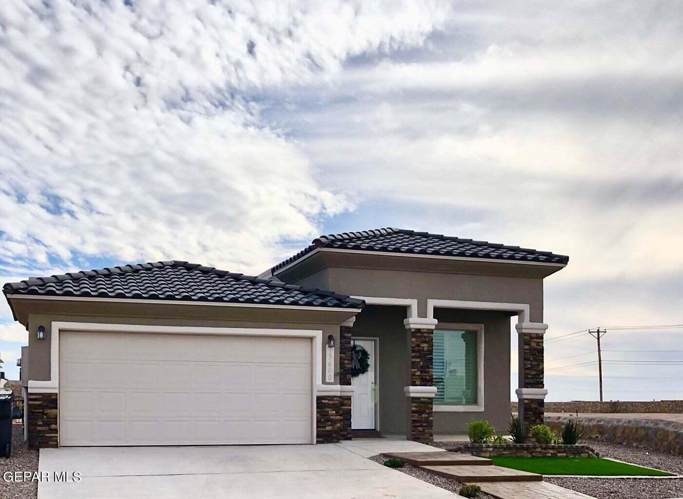 12169 Bahjat Drive El Paso, TX 79934 - Photo 1 of 1 front view of a house with a barbeque