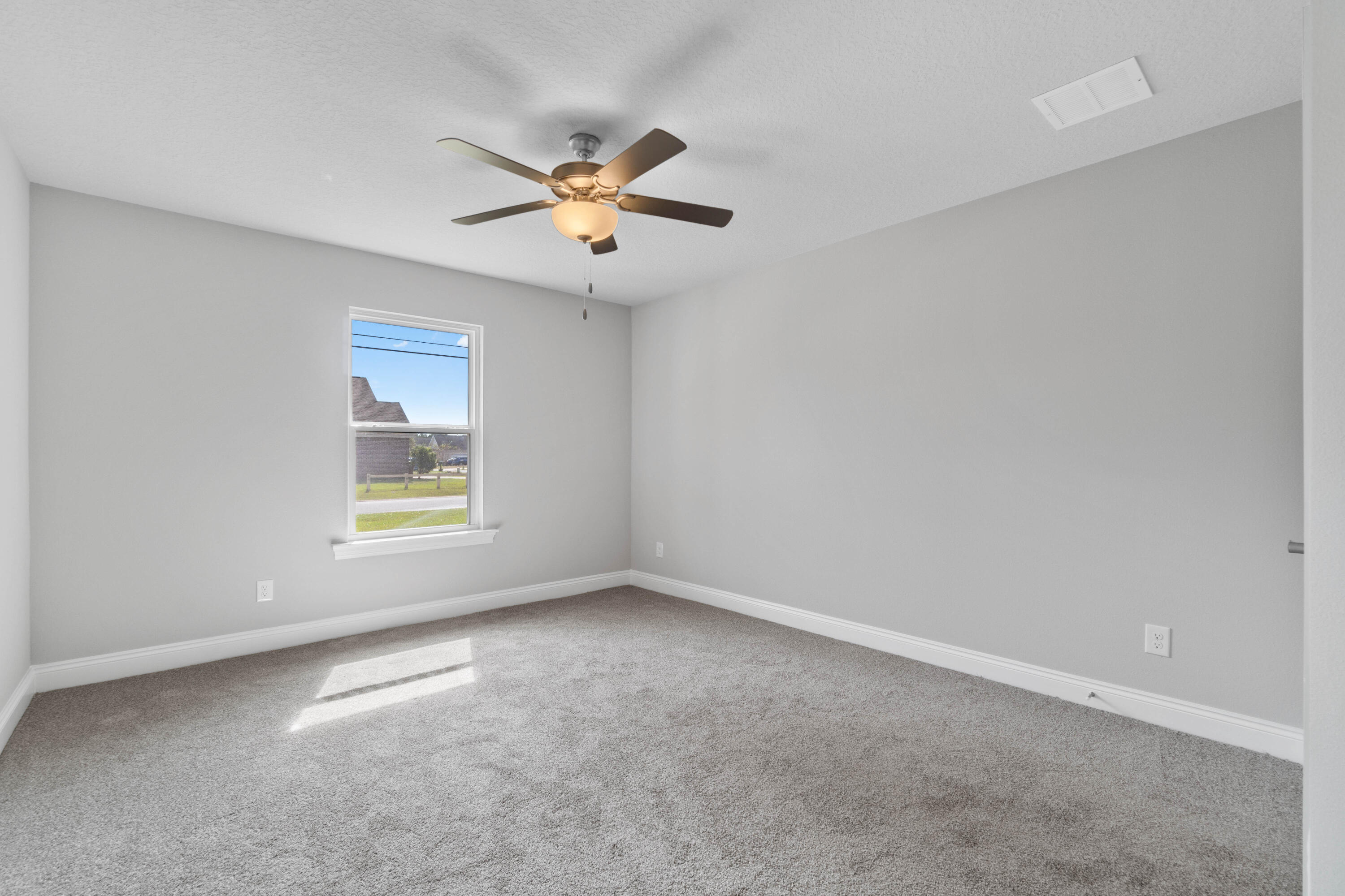 3548 Bob Tolbert Road Navarre, FL 32566 - Photo 3 of 47 a view of an empty room with a window