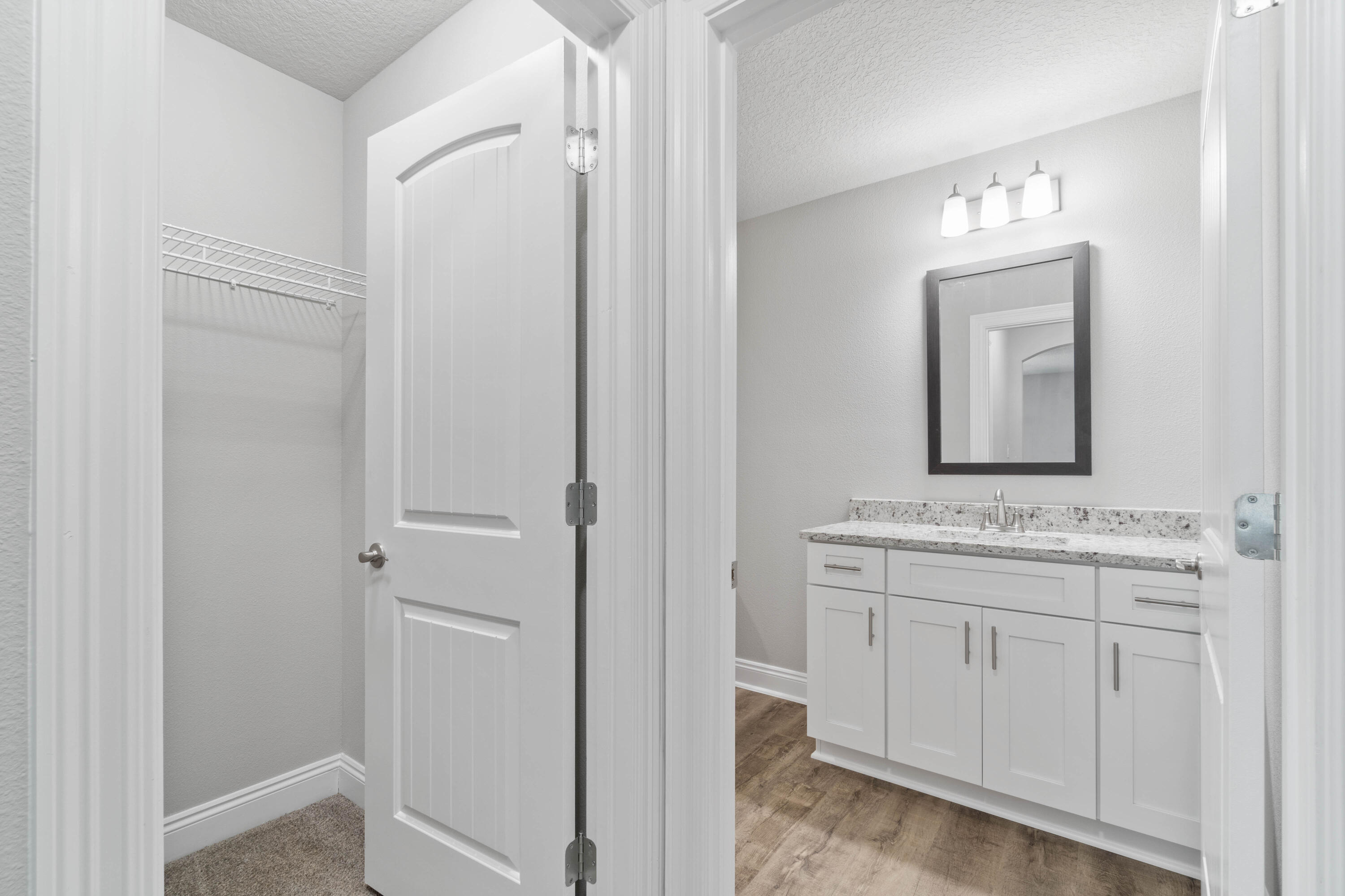 3548 Bob Tolbert Road Navarre, FL 32566 - Photo 31 of 47 a bathroom with a sink and a mirror