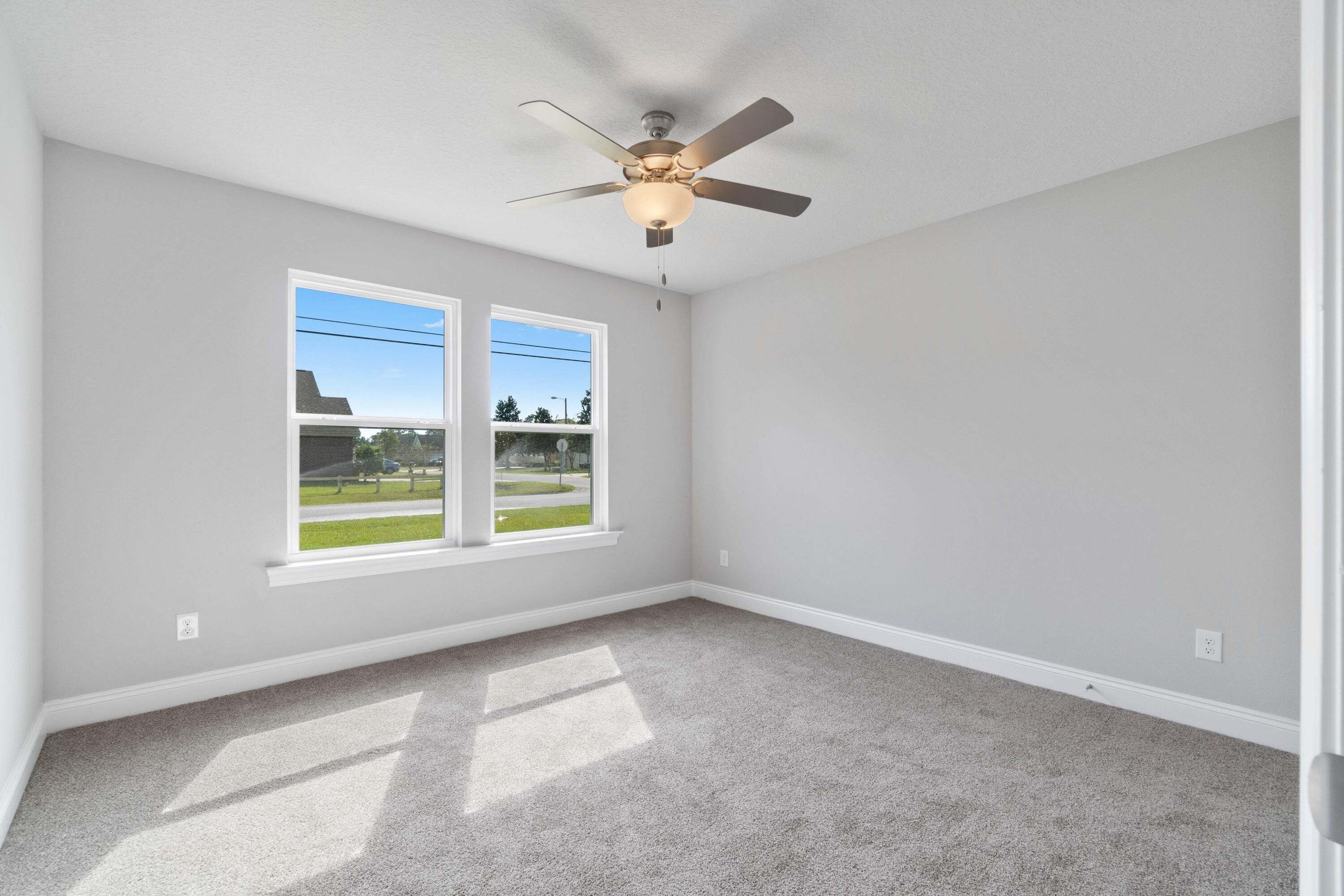 3548 Bob Tolbert Road Navarre, FL 32566 - Photo 37 of 47 a view of a livingroom with a ceiling fan and window