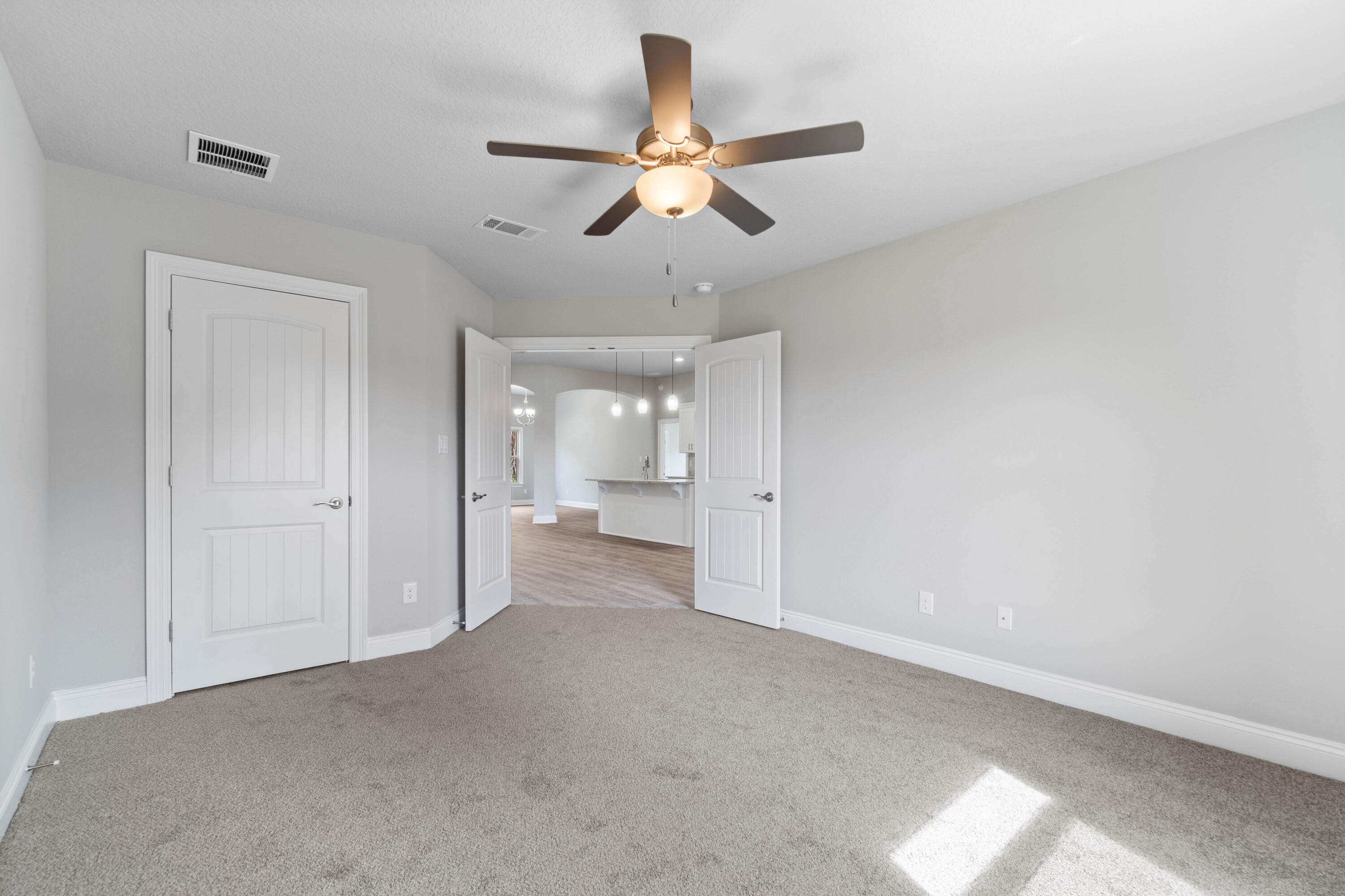 3548 Bob Tolbert Road Navarre, FL 32566 - Photo 4 of 47 a view of empty room with a ceiling fan