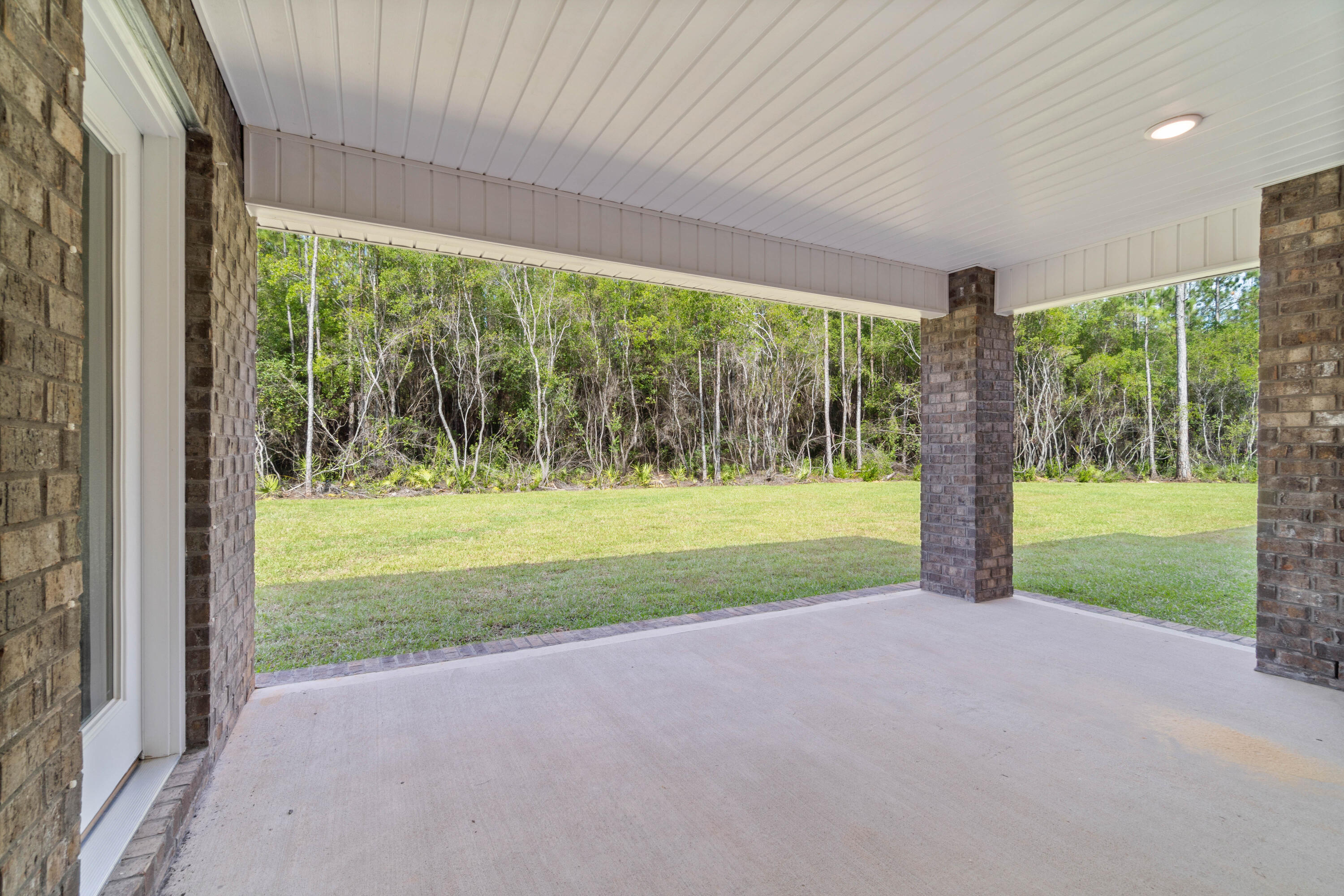 3548 Bob Tolbert Road Navarre, FL 32566 - Photo 42 of 47 a view of green field with trees in the background