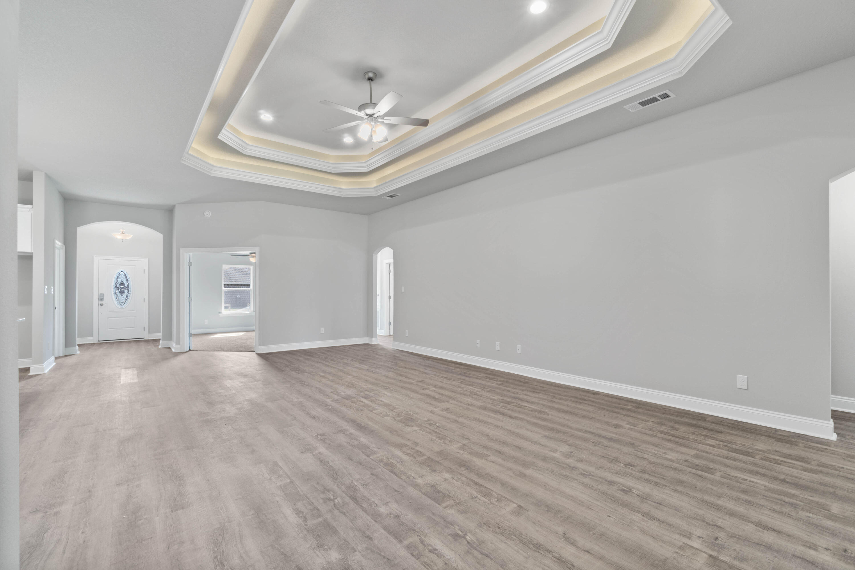 3548 Bob Tolbert Road Navarre, FL 32566 - Photo 9 of 47 wooden floor in an empty room
