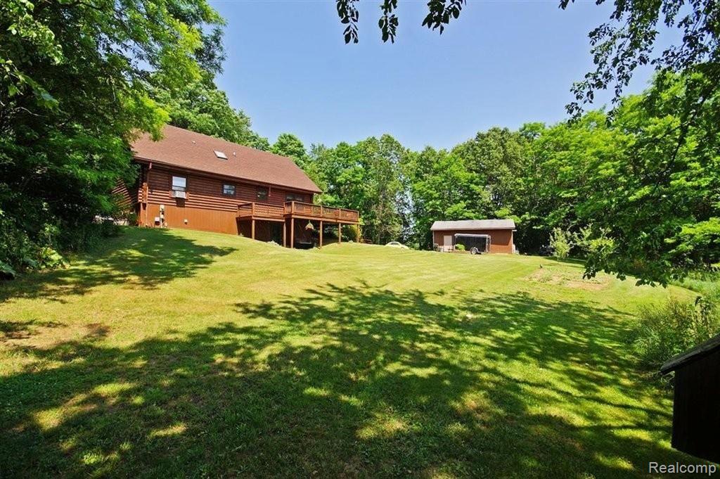 6122 Pingree Road Howell, MI 48843 - Photo 3 of 23 Wooded, private setting