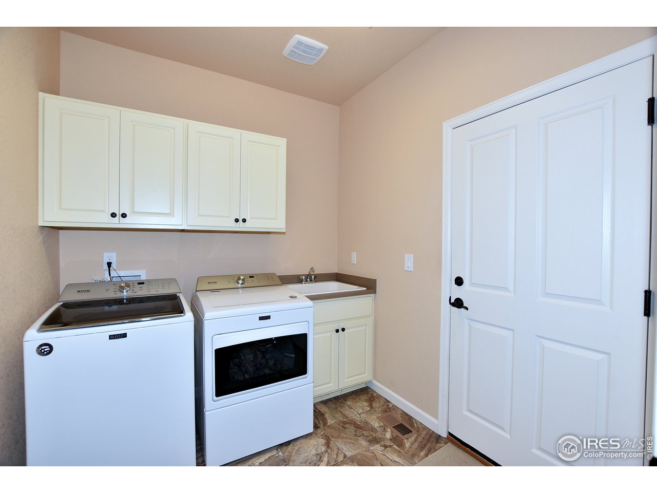 745 Province Road Fort Collins, CO 80525 - Photo 23 of 38 Main Floor Laundry with Sink