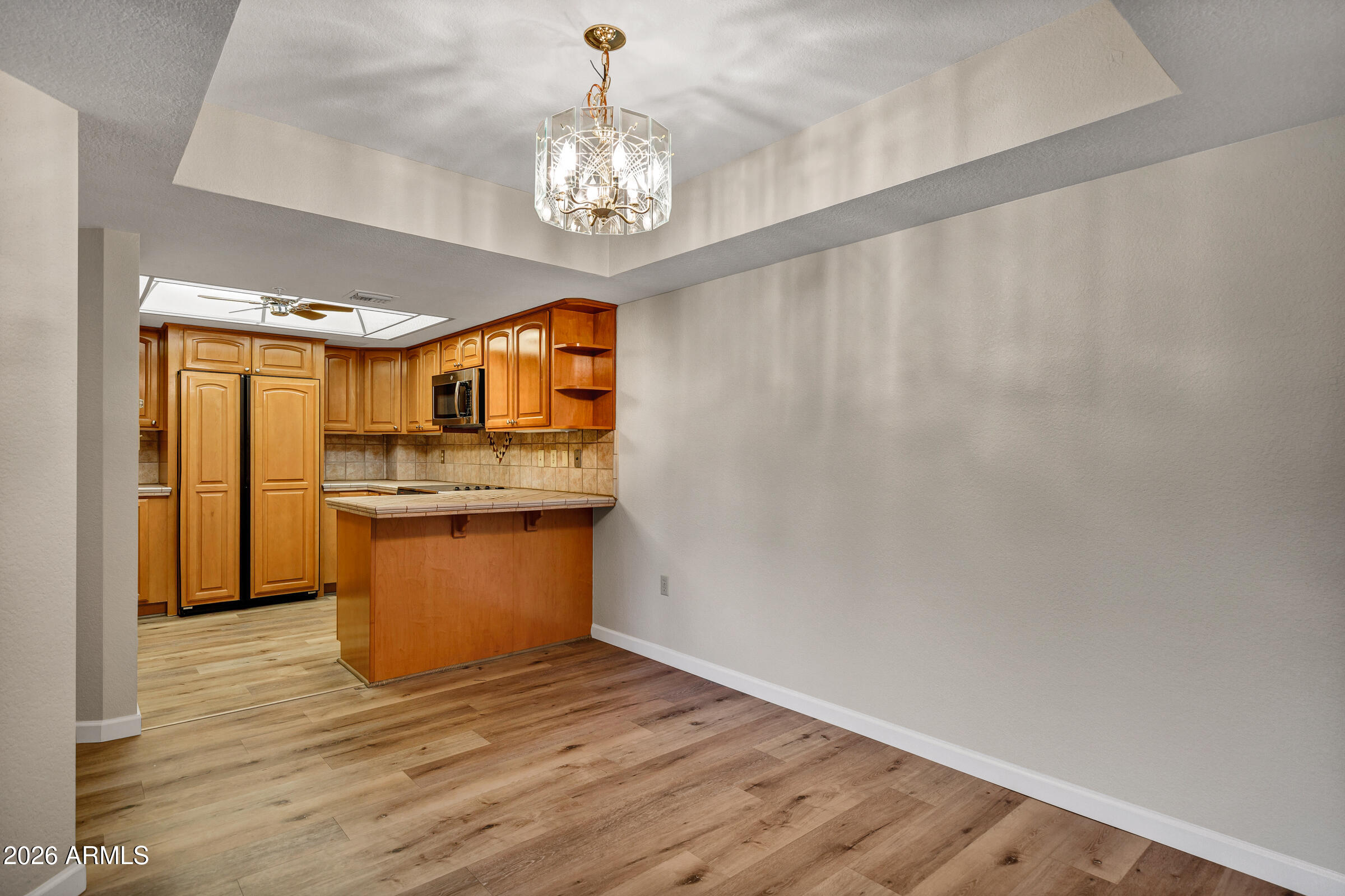 4200 North Miller Road, Unit 321 Scottsdale, AZ 85251 - Photo 20 of 41 a view of a kitchen with a sink and dishwasher