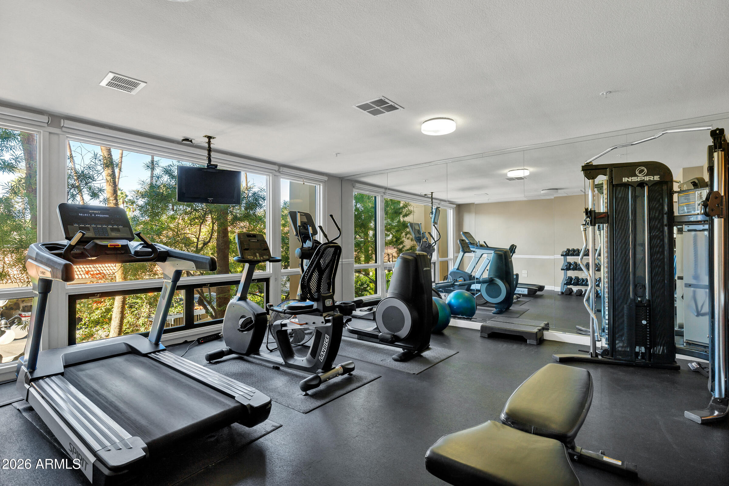 4200 North Miller Road, Unit 321 Scottsdale, AZ 85251 - Photo 8 of 41 a view of a room with gym equipment