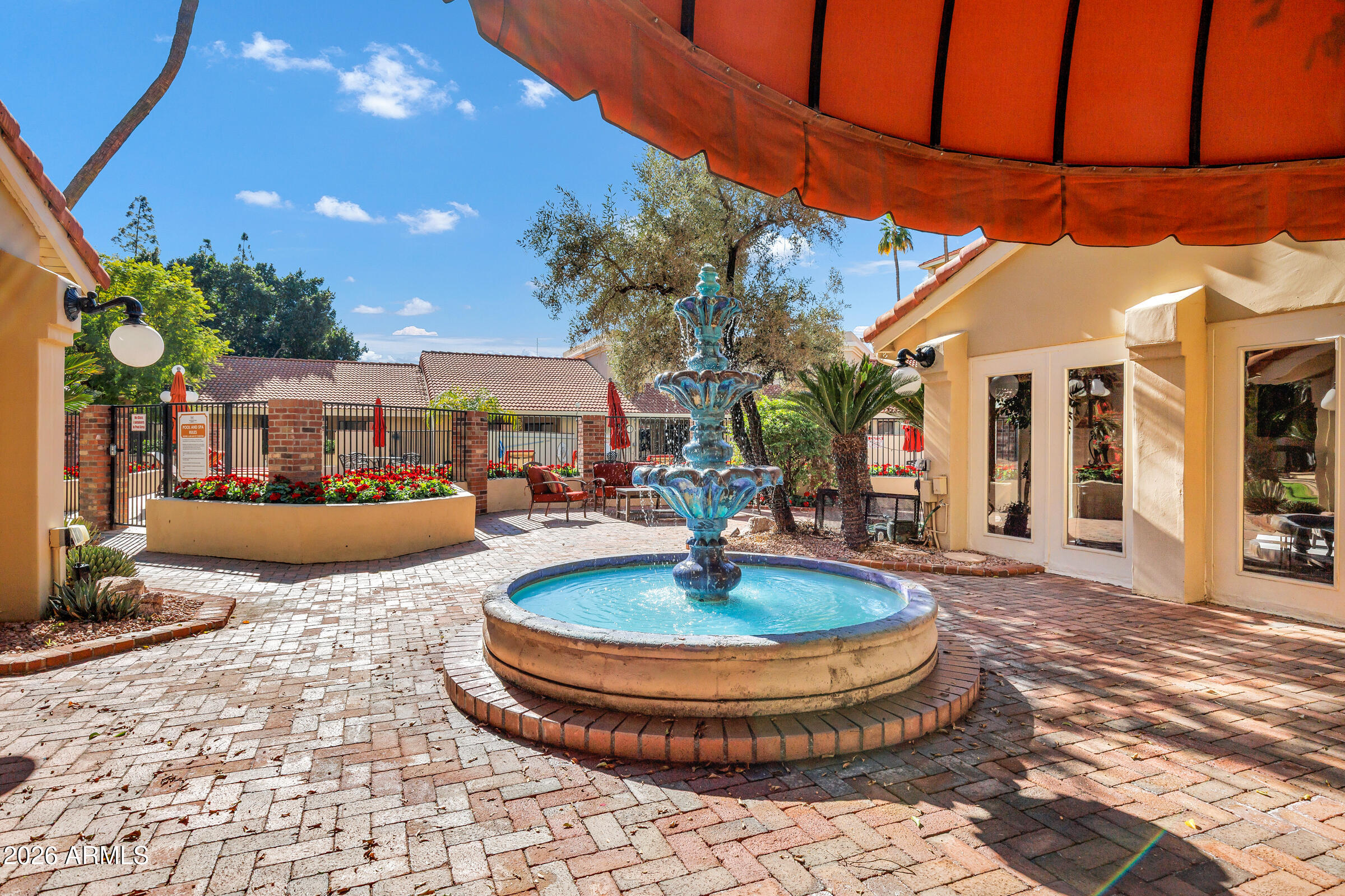4200 North Miller Road, Unit 321 Scottsdale, AZ 85251 - Photo 9 of 41 a front view of a house with entertaining space