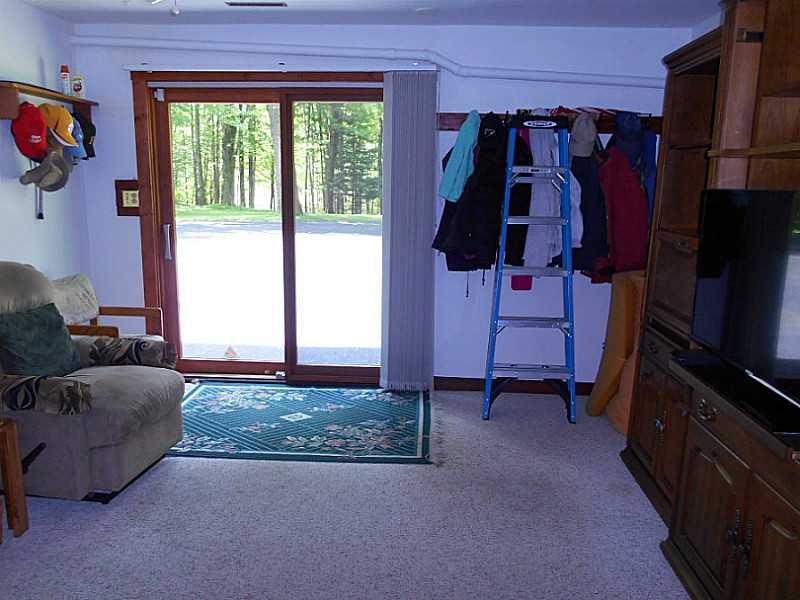 6183 Scott Road Jamestown, PA 16134 - Photo 15 of 25 Family Room. Lower Level Family Room with Sliding Glass Doors to Exterior Back.
