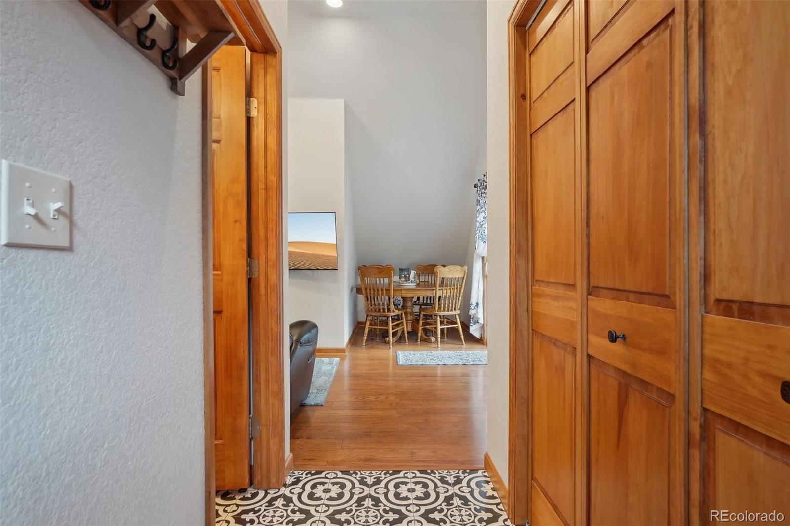 125 Aspen Road Black Hawk, CO 80422 - Photo 30 of 44 a dining room with table and chairs