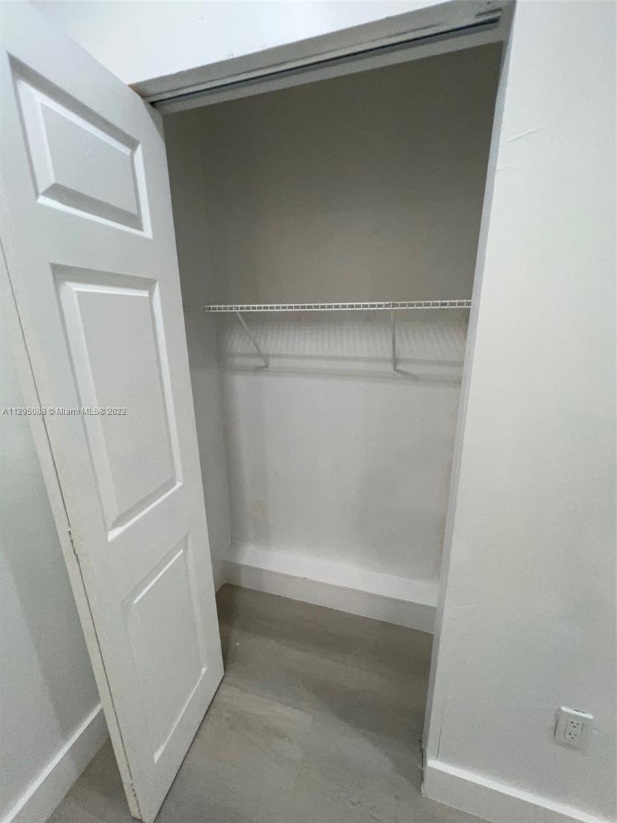 Brownsville Miami, FL 33142 - Photo 17 of 33 a bathroom with a bathtub