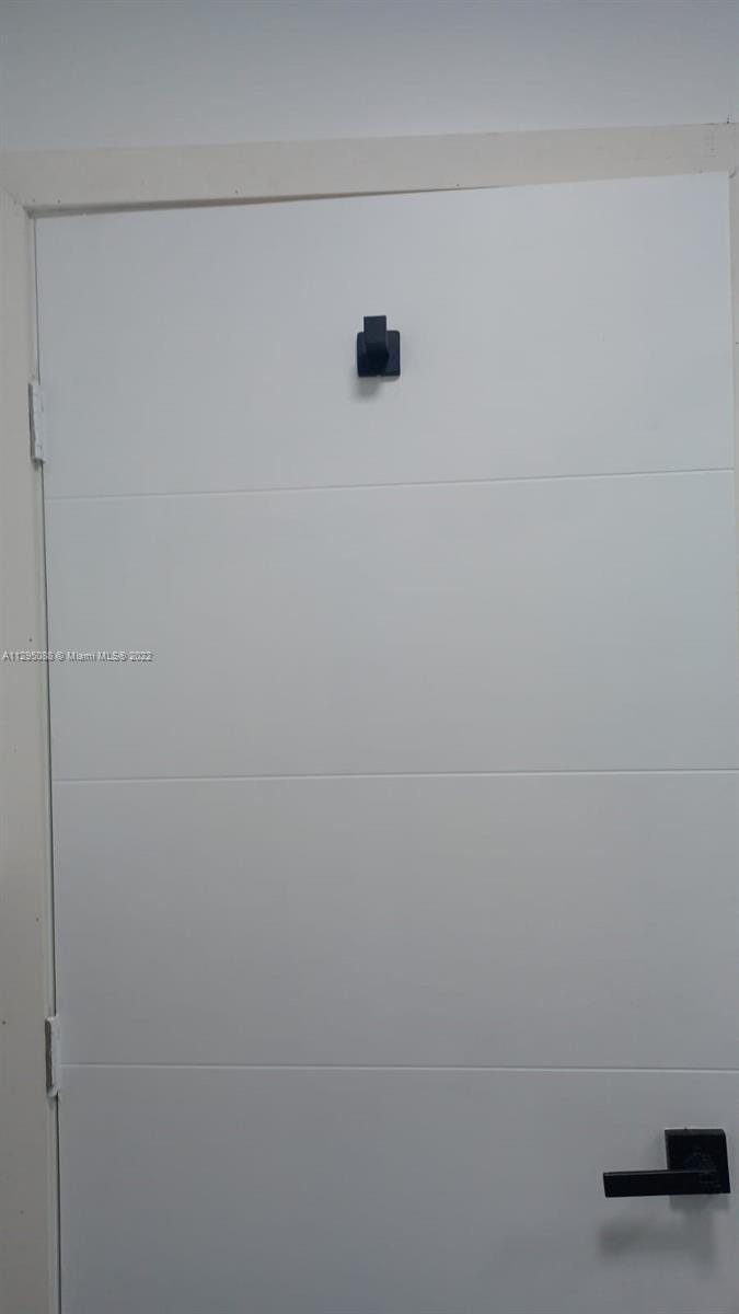 Brownsville Miami, FL 33142 - Photo 23 of 33 a close up of a white marble wall
