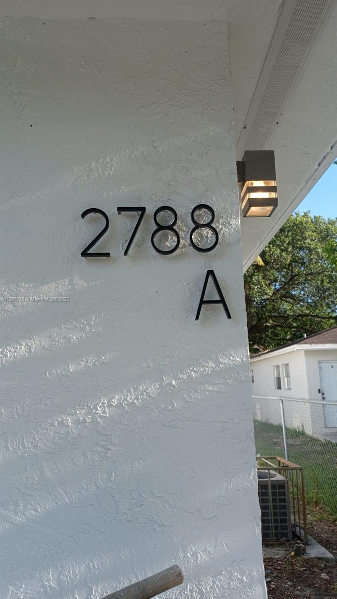 Brownsville Miami, FL 33142 - Photo 24 of 33 a view of door lock