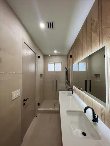 a view of an empty room with a fireplace