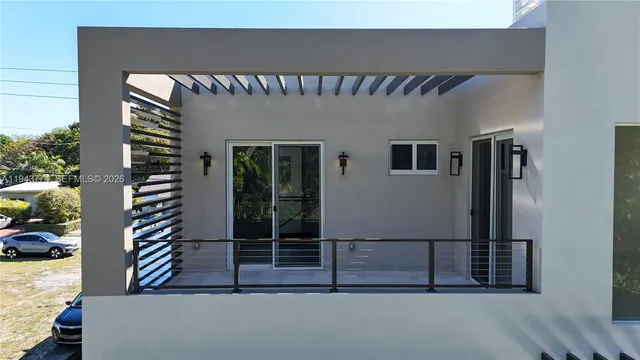 a view of a house with pool and a yard