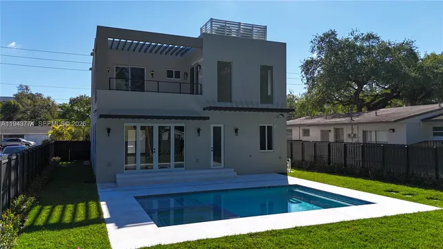a backyard of a house with lots of green space