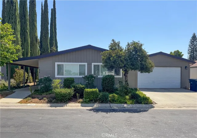 front view of house with a yard