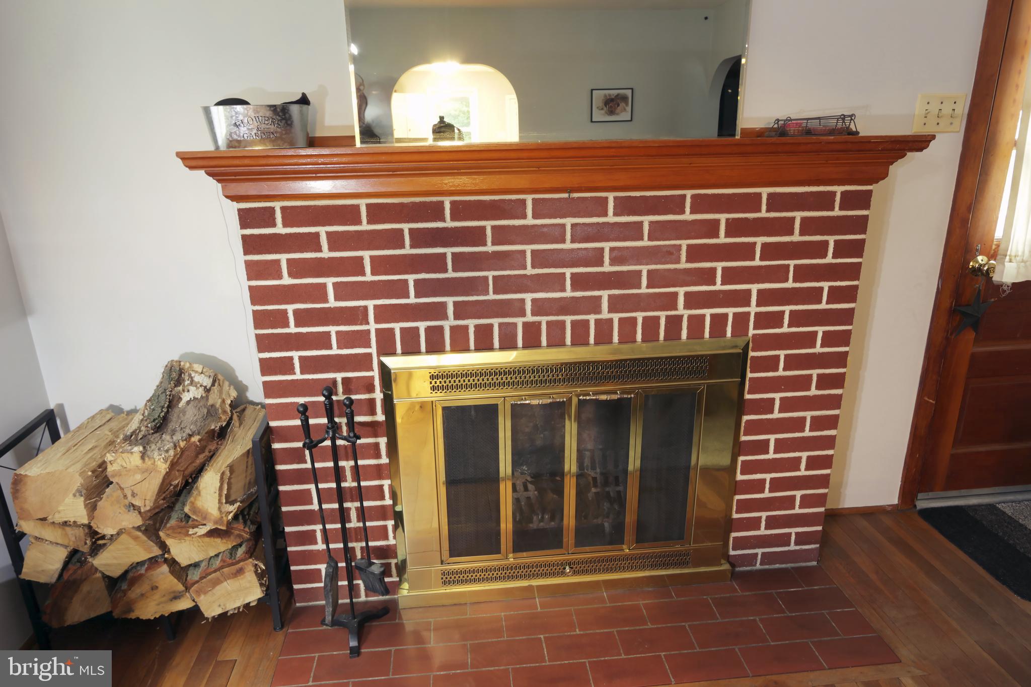3950 Locust Grove Road Columbia, PA 17512 - Photo 14 of 30 Wood fireplace