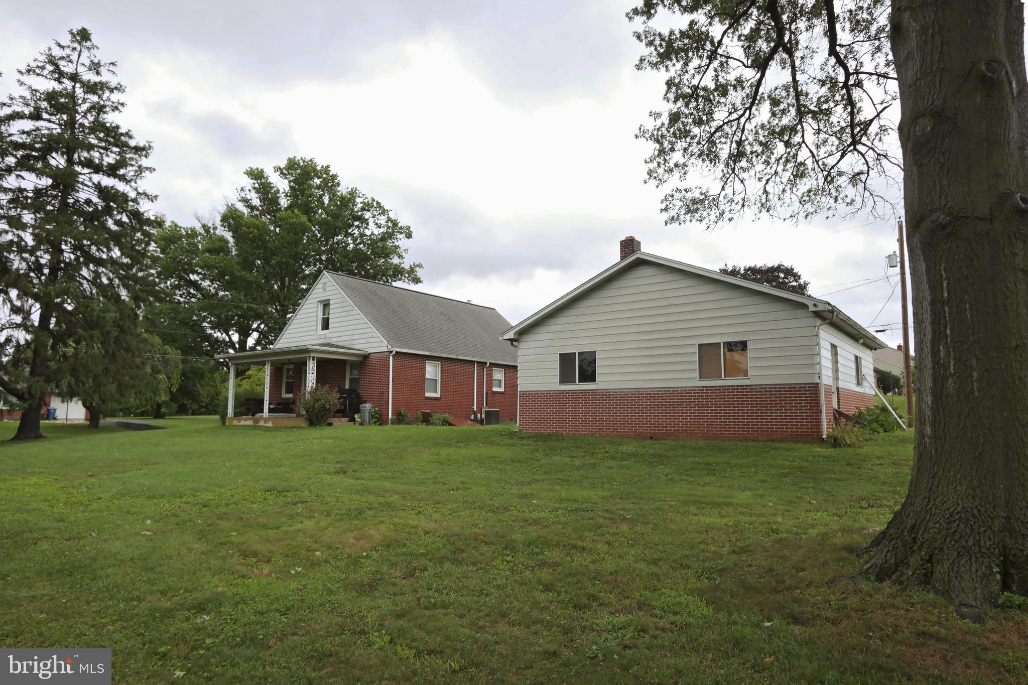 3950 Locust Grove Road Columbia, PA 17512 - Photo 7 of 30 Rear view of parking and large garage. 73 ac. too