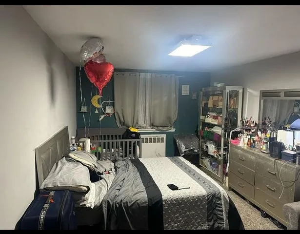 a bedroom with furniture and a bed