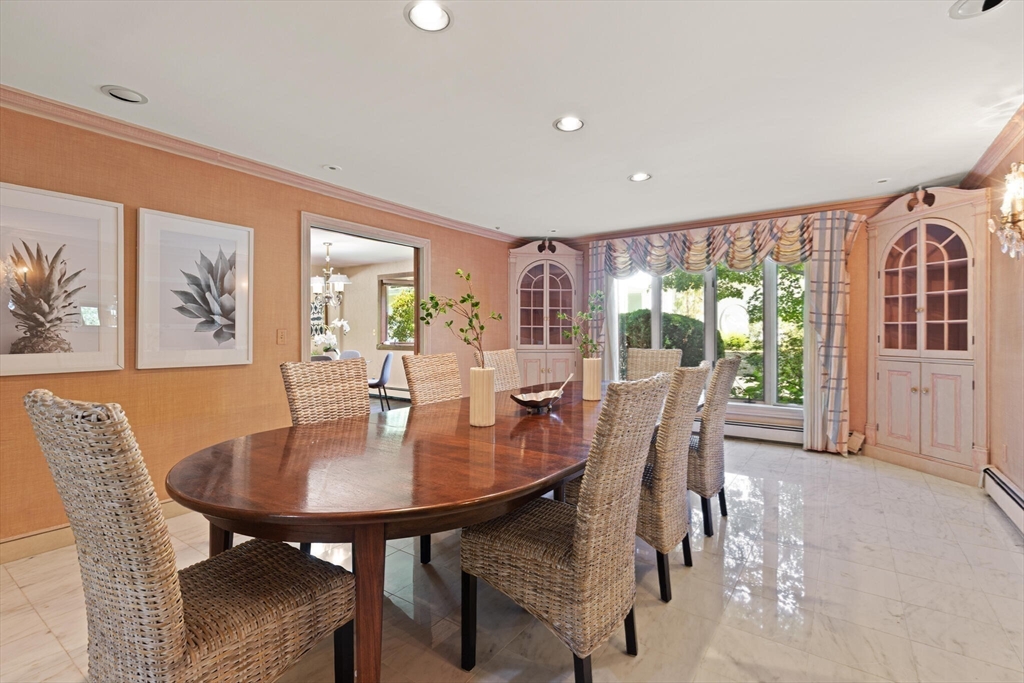 77 Wellesley Road Belmont, MA 02478 - Photo 11 of 31 a view of a dining room with furniture window and outside view
