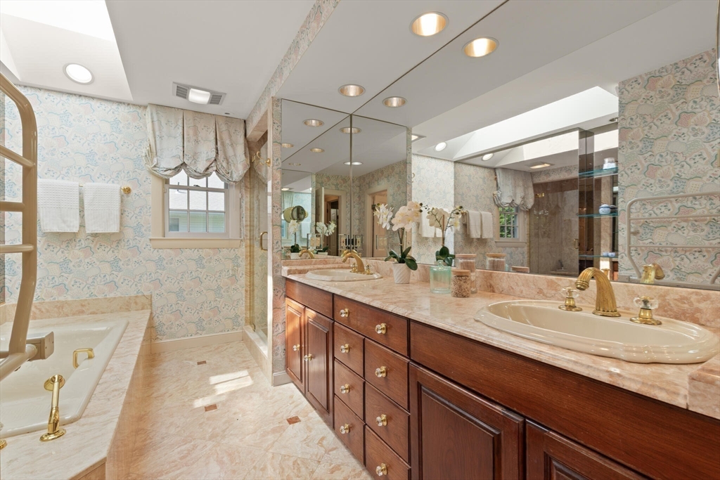 77 Wellesley Road Belmont, MA 02478 - Photo 20 of 31 a bathroom with a tub sink and mirror