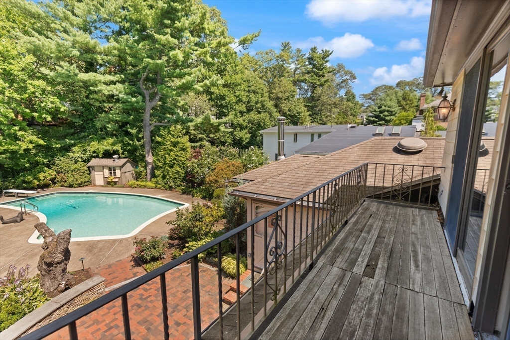 77 Wellesley Road Belmont, MA 02478 - Photo 26 of 31 a view of a balcony with wooden floor and seating space