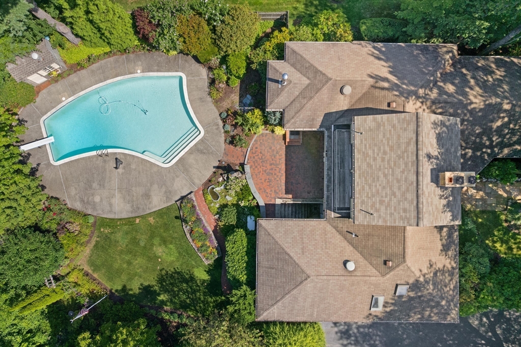 77 Wellesley Road Belmont, MA 02478 - Photo 3 of 31 an aerial view of a house
