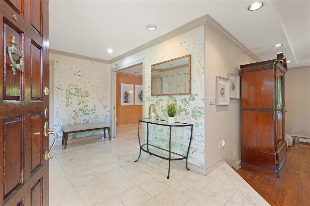 77 Wellesley Road Belmont, MA 02478 - Photo 5 of 31 a room with furniture a window and stainless steel appliances