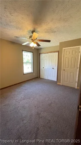 a view of empty room with windows