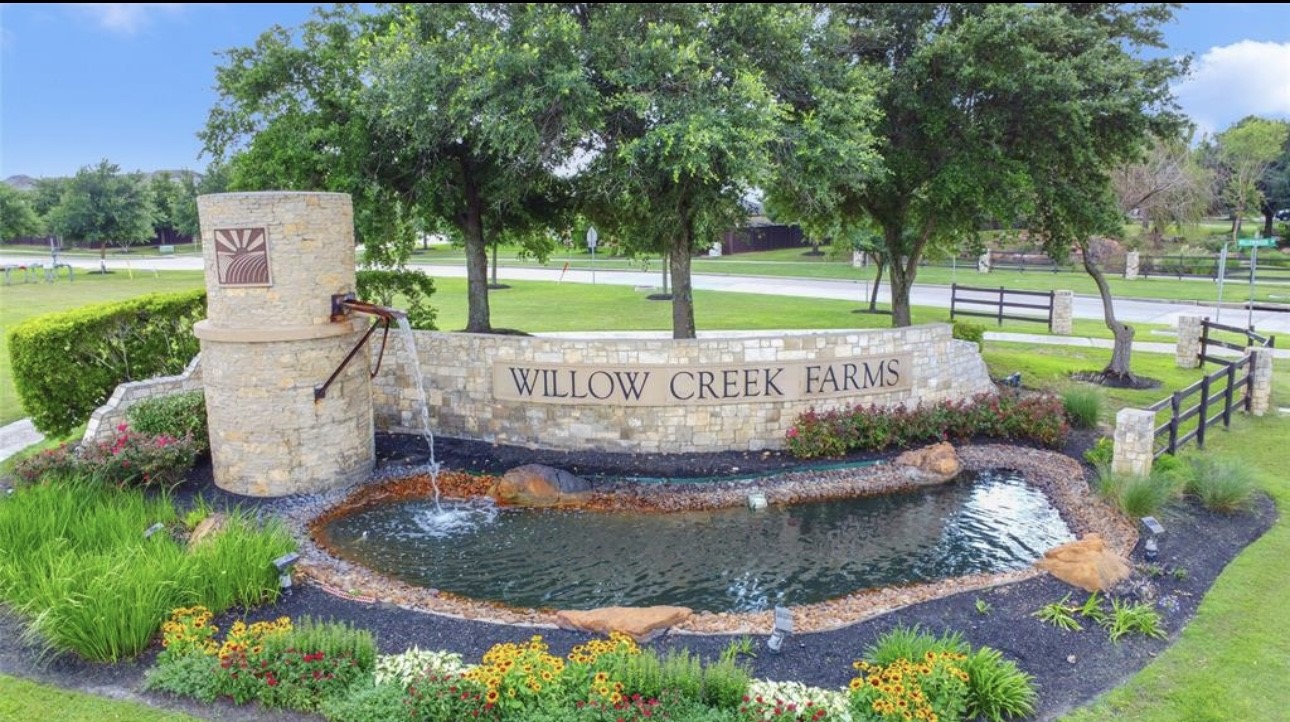 9972 Spring Rock Lane Brookshire, TX 77423 - Photo 15 of 16 a view of a park with a slide and table and chairs