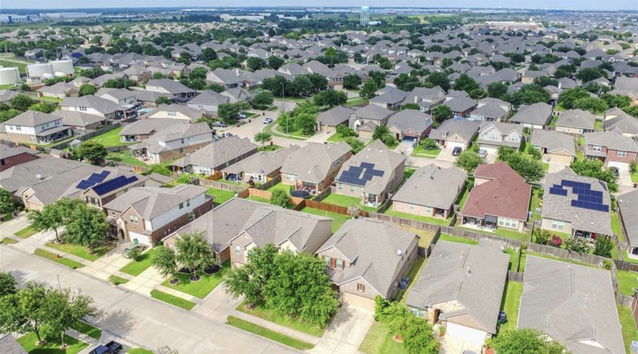 9972 Spring Rock Lane Brookshire, TX 77423 - Photo 16 of 16 an aerial view of a city with lots of residential buildings