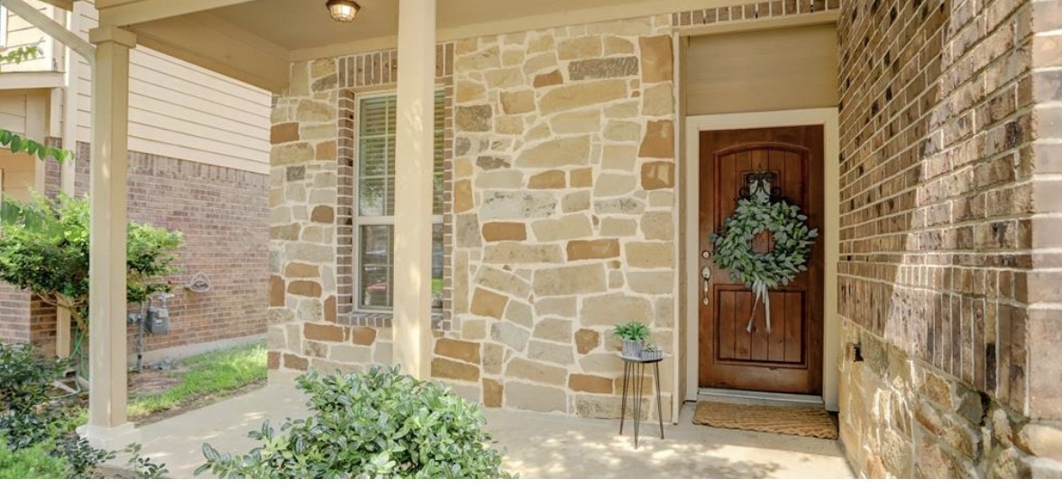 9972 Spring Rock Lane Brookshire, TX 77423 - Photo 2 of 16 a view of a door with a porch
