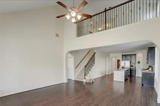 a view of an entryway with wooden floor