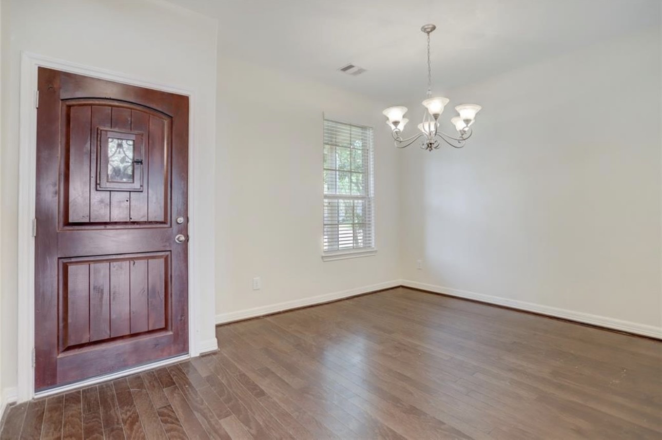9972 Spring Rock Lane Brookshire, TX 77423 - Photo 7 of 16 a view of a livingroom with wooden floor