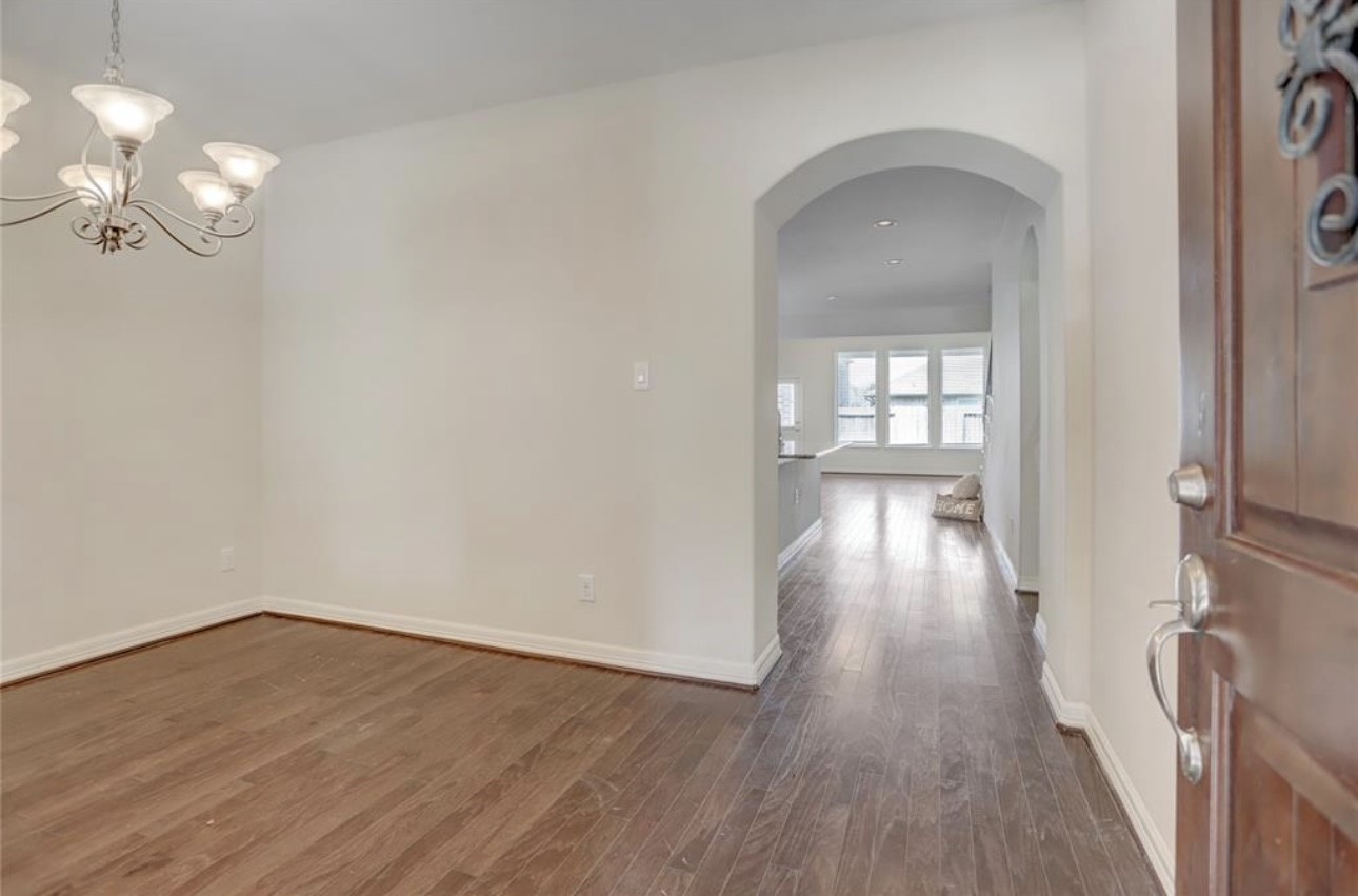 9972 Spring Rock Lane Brookshire, TX 77423 - Photo 8 of 16 a view of empty room with wooden floor