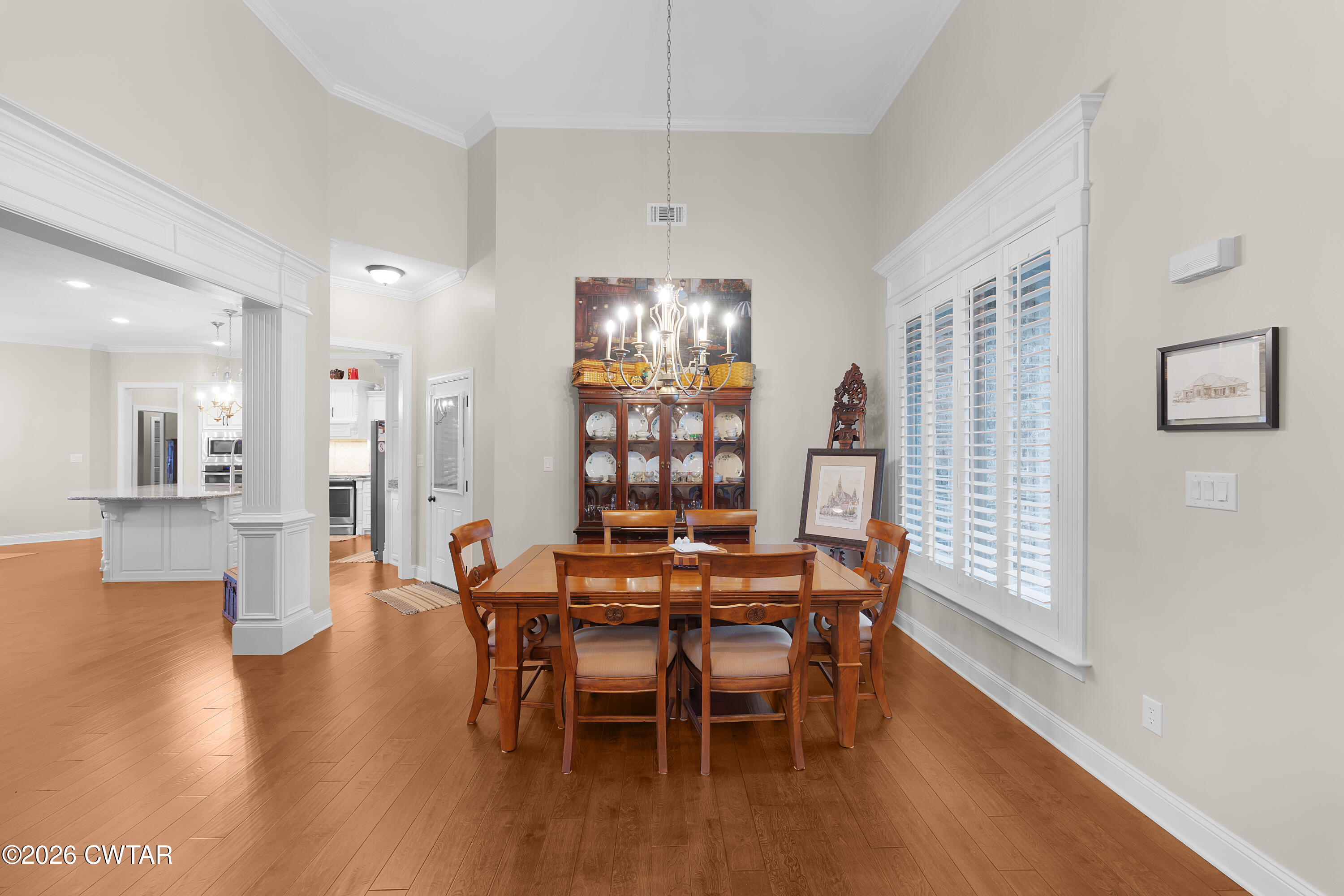 34 Cheddleton Cove Jackson, TN 38305 - Photo 2 of 32 a view of a dining room with furniture window and wooden floor