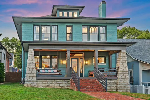 front view of a house with a small yard