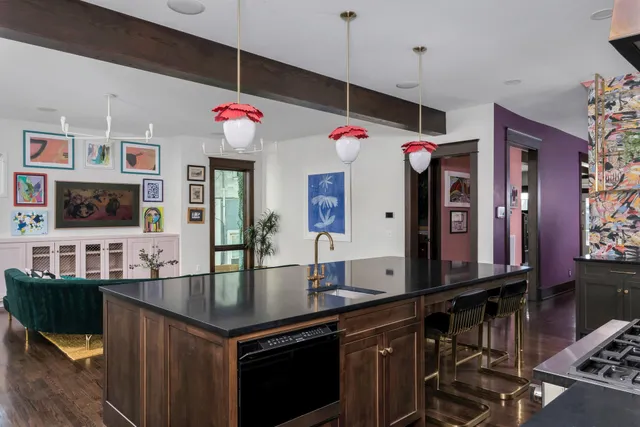 a view of hallway with furniture and a window
