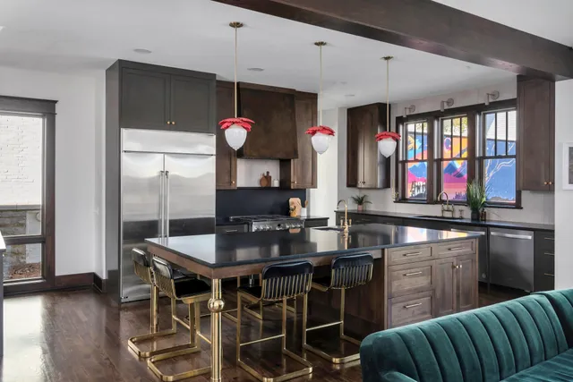 a view of an entryway with wooden floor