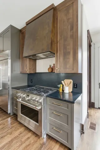 a bathroom with a sink toilet and mirror